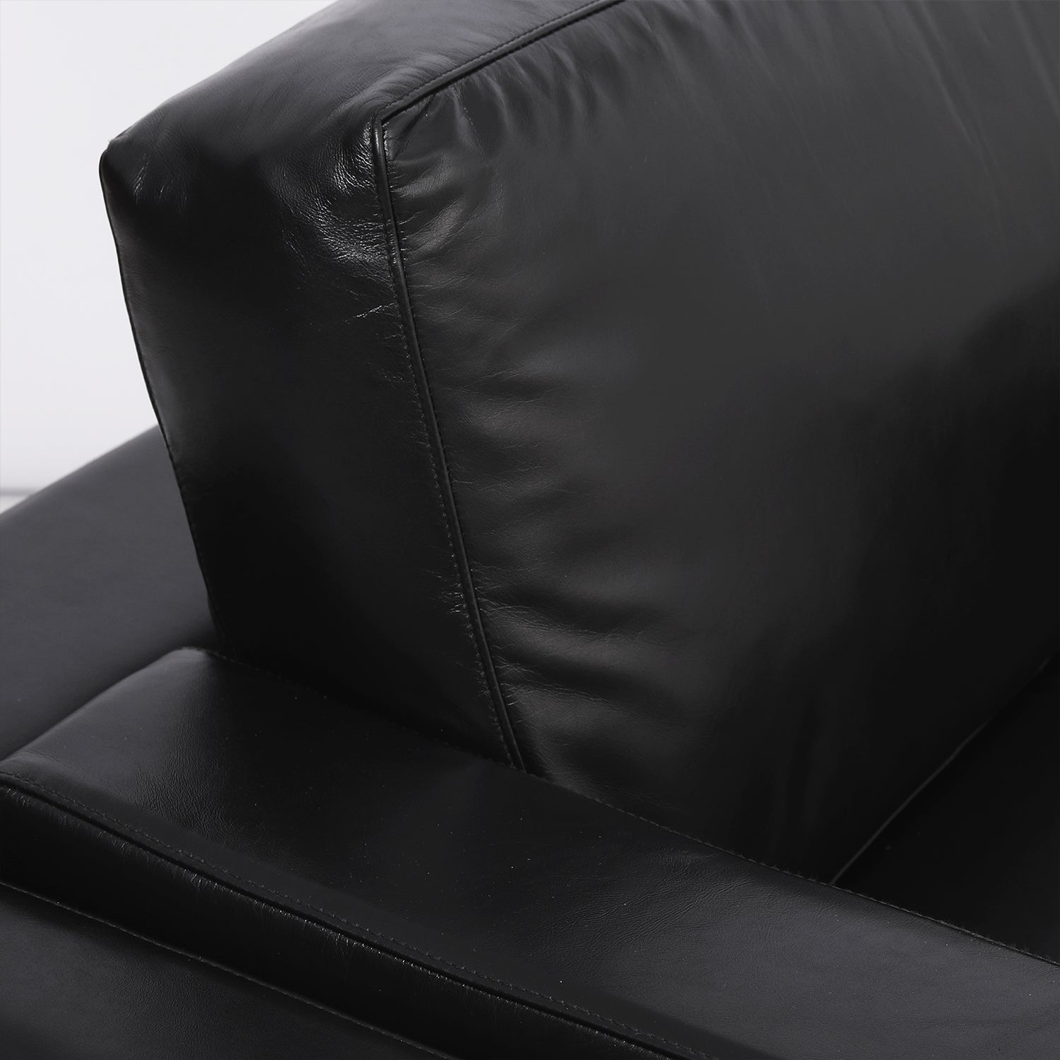 Arthur Ara Leather Chair Coal Front Close Up Arm and Back Cushion